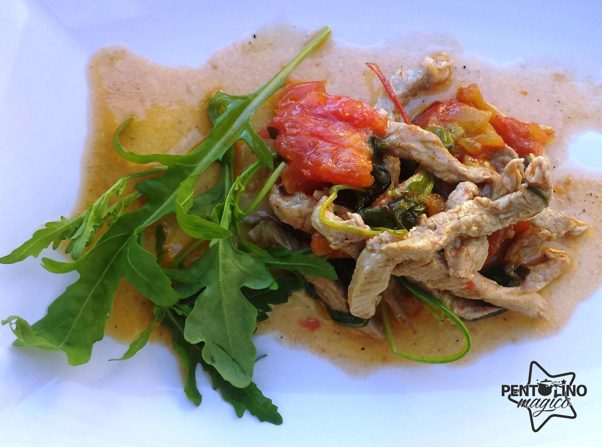 straccetti di vitella con rucola e pomodori